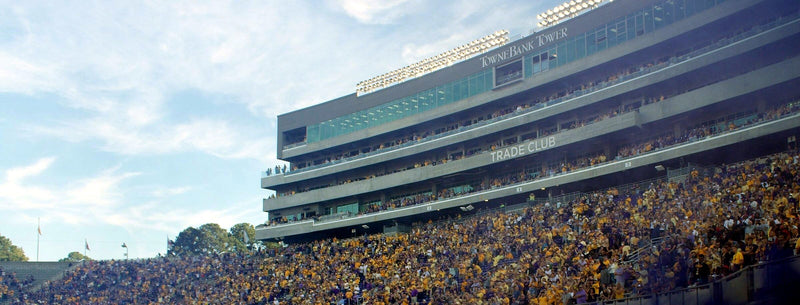 The TowneBank Tower side of Dowdy-Ficklen Stadium in Greenville, packed with fans in purple and gold