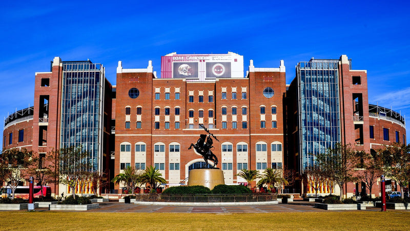 The south entrance of Doak Campbell Stadium and the Unconquered statue in Tallahassee, Florida