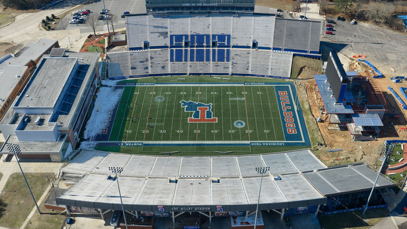Aerial view of Joe Aillet Stadium in Ruston, Louisiana, with the home stands, the field and the lots behind