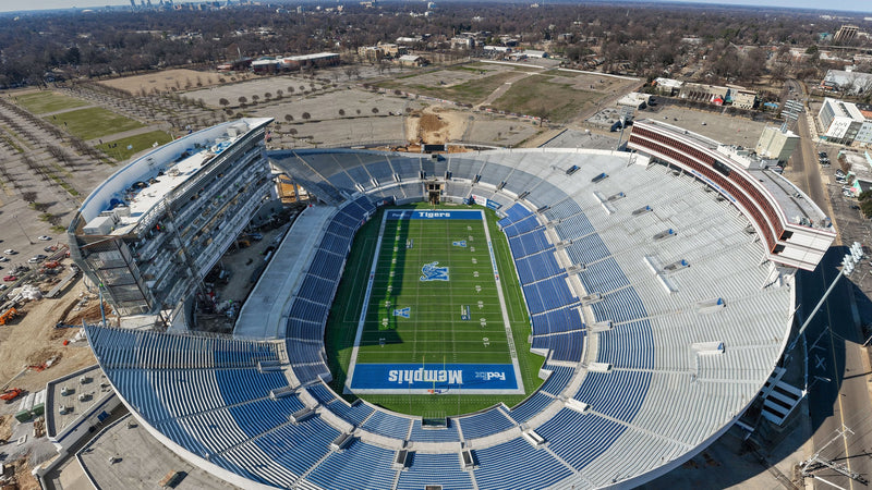 Aerial view of Simmons Bank Liberty Stadium in Memphis during its renovation, with Tiger Lane and the Liberty Park lots behind it