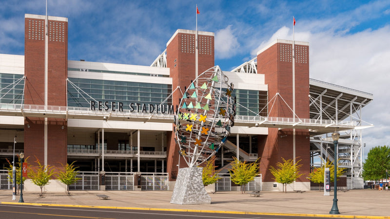 The east entrance of Reser Stadium in Corvallis, with a public art football sculpture out front
