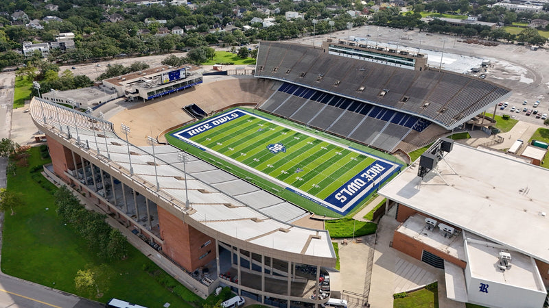 Aerial view of the Rice football stadium in Houston, with the press box, the field and the stadium lots beyond