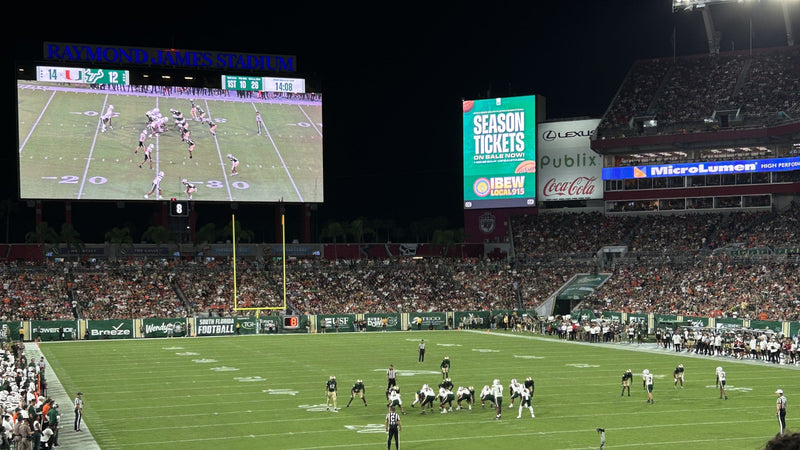 A USF Bulls night game at Raymond James Stadium in Tampa, seen from the student section