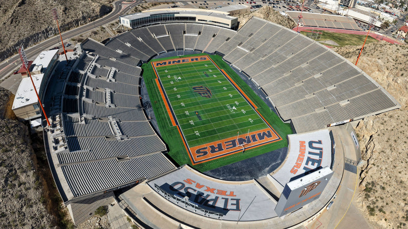 Aerial view of Sun Bowl Stadium in El Paso, set into the desert hillside on the UTEP campus