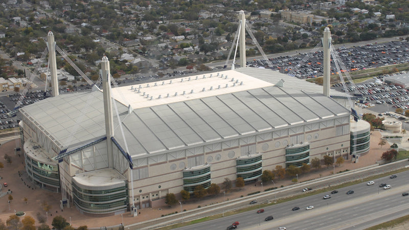 The Alamodome from above, seen from the Tower of the Americas, with full parking lots behind it