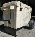 Load image into Gallery viewer, Tan cooler on the wheel kit from the corner, showing a rope handle, one wheel and the black kickstand