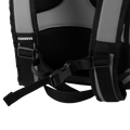 Load image into Gallery viewer, Close-up of the chest strap buckle across the gray backpack cooler's padded shoulder straps