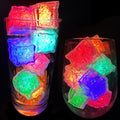 Load image into Gallery viewer, A pint glass and a wine glass filled with glowing red, blue, green, aqua and orange light-up cubes