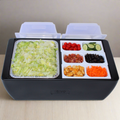 Load image into Gallery viewer, Black cooler set up as a salad bar: lettuce in a foil pan, tomatoes, bacon, olives, croutons and carrots in trays