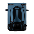 Load image into Gallery viewer, Back of the slate-blue backpack cooler with both shoulder straps, chest strap and lower tie-down loops