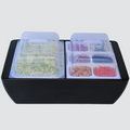 Load image into Gallery viewer, Black cooler with clear dome lids closed over a lettuce pan and condiment trays of tomatoes, olives, chicken and carrots