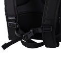 Load image into Gallery viewer, Close-up of the chest strap buckle on the all-black backpack cooler's padded shoulder straps