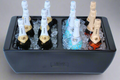Load image into Gallery viewer, Black two-compartment cooler packed with sparkling wine bottles on ice, ready for a mimosa or toast station