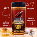 Load image into Gallery viewer, Honey Rub shaker with arrows pointing to its main ingredients: salt, dried honey, paprika and garlic powder
