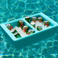 Load image into Gallery viewer, Teal two-compartment cooler floating in a swimming pool, filled with beer cans on ice