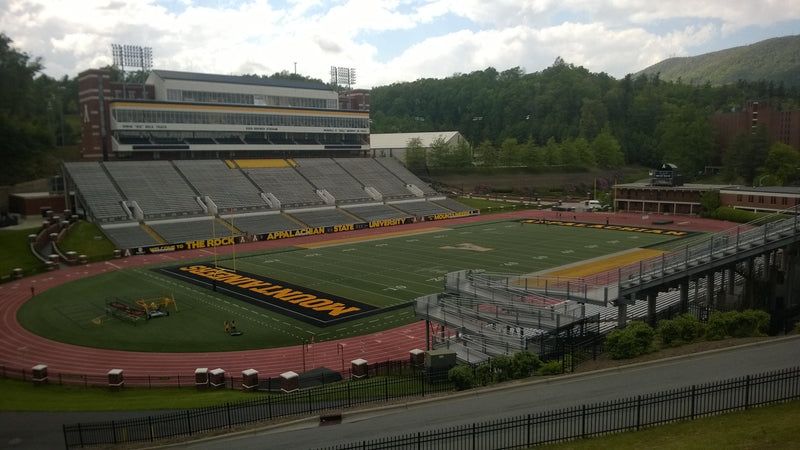 Kidd Brewer Stadium in Boone, seen from outside the southeast corner with the mountains behind