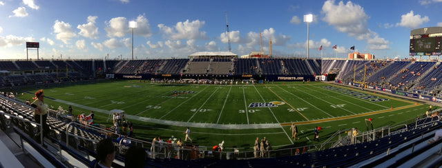 Panorama of the field and stands at FIU's football stadium in Miami on a sunny afternoon