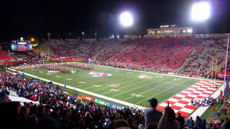 Night view across the field and stands at Valley Children's Stadium in Fresno, with the checkered end zone