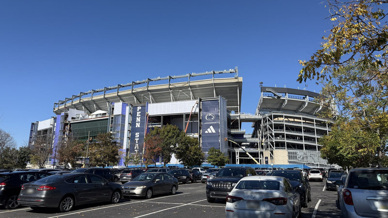 Beaver Stadium from a west-side parking lot in October 2026, with renovation work under way