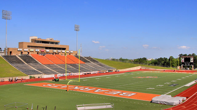 Bowers Stadium in Huntsville in 2014, the west stands and press box seen across the orange end zone