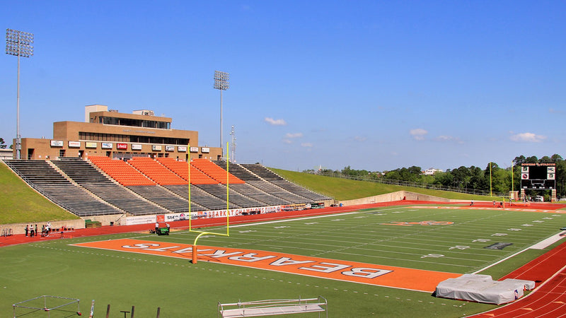 Bowers Stadium in Huntsville in 2014, the west stands and press box seen across the orange end zone