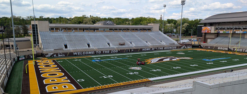 Stafford-Smith Field at Waldo Stadium in Kalamazoo, seen from the hillside above the end zone with the stands empty
