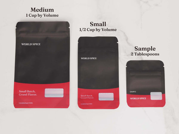Three black and red World Spice pouches, medium, small and sample, labeled 1 cup, 1/2 cup and 2 tablespoons