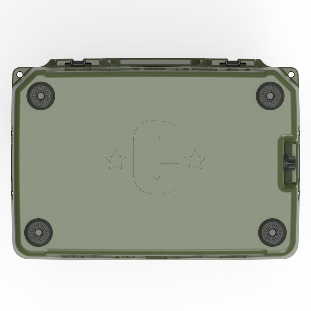 Underside of the olive green hard cooler with four rubber feet and a molded C logo