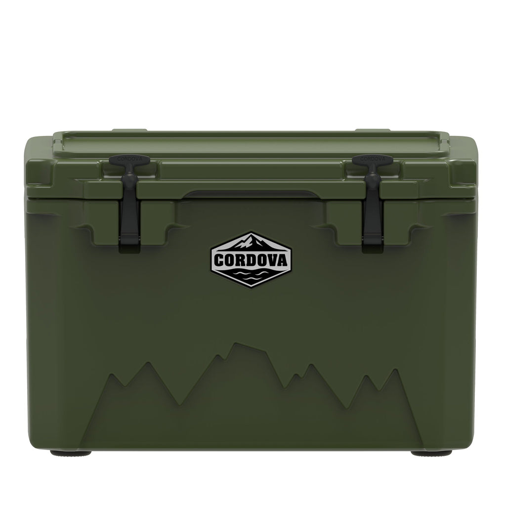 Olive green hard cooler from the front, two black rubber latches, a Cordova badge and a mountain graphic