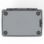 Underside of the charcoal gray hard cooler with four rubber feet and a molded C logo