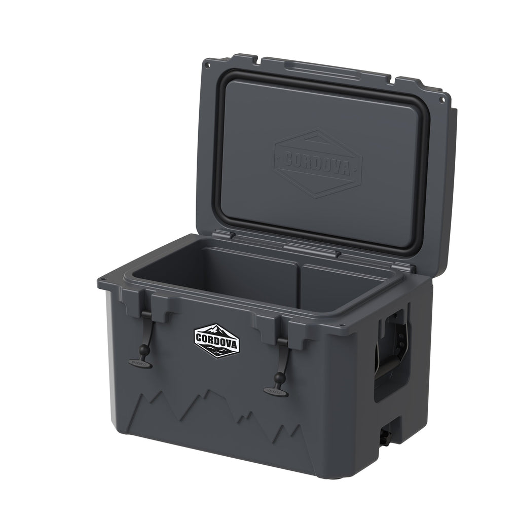 Charcoal gray hard cooler from a low angle with the lid propped open