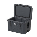 Charcoal gray hard cooler from a low angle with the lid propped open