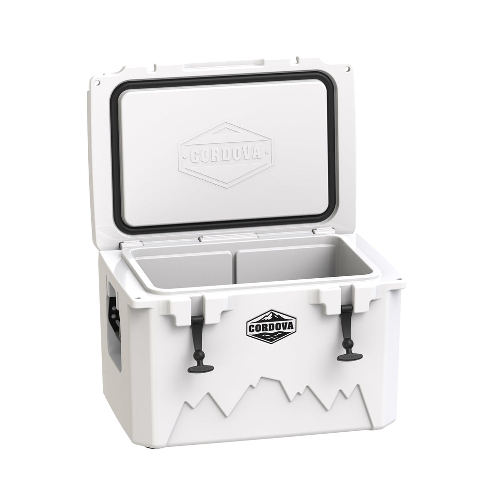 White hard cooler at an angle with the lid open, showing the gasket and empty well