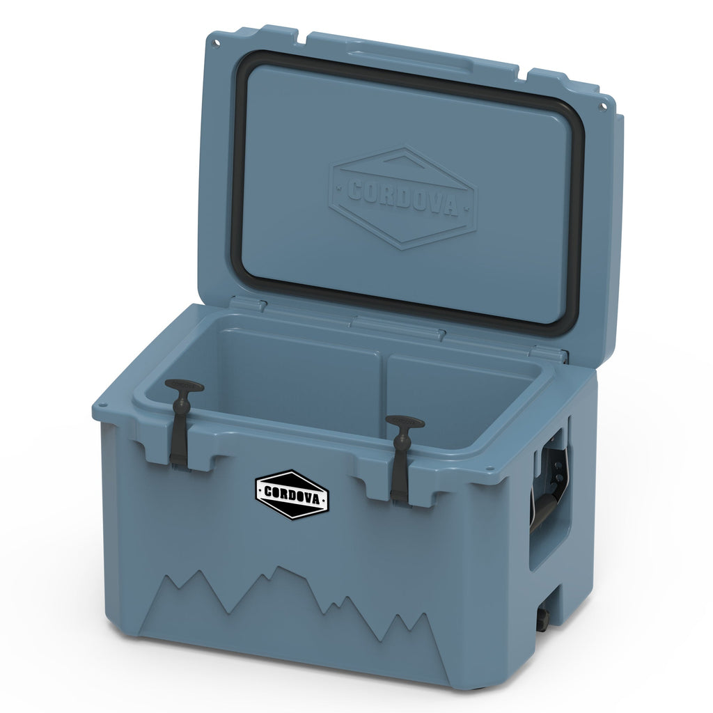 Slate-blue hard cooler from a low angle with the lid propped open
