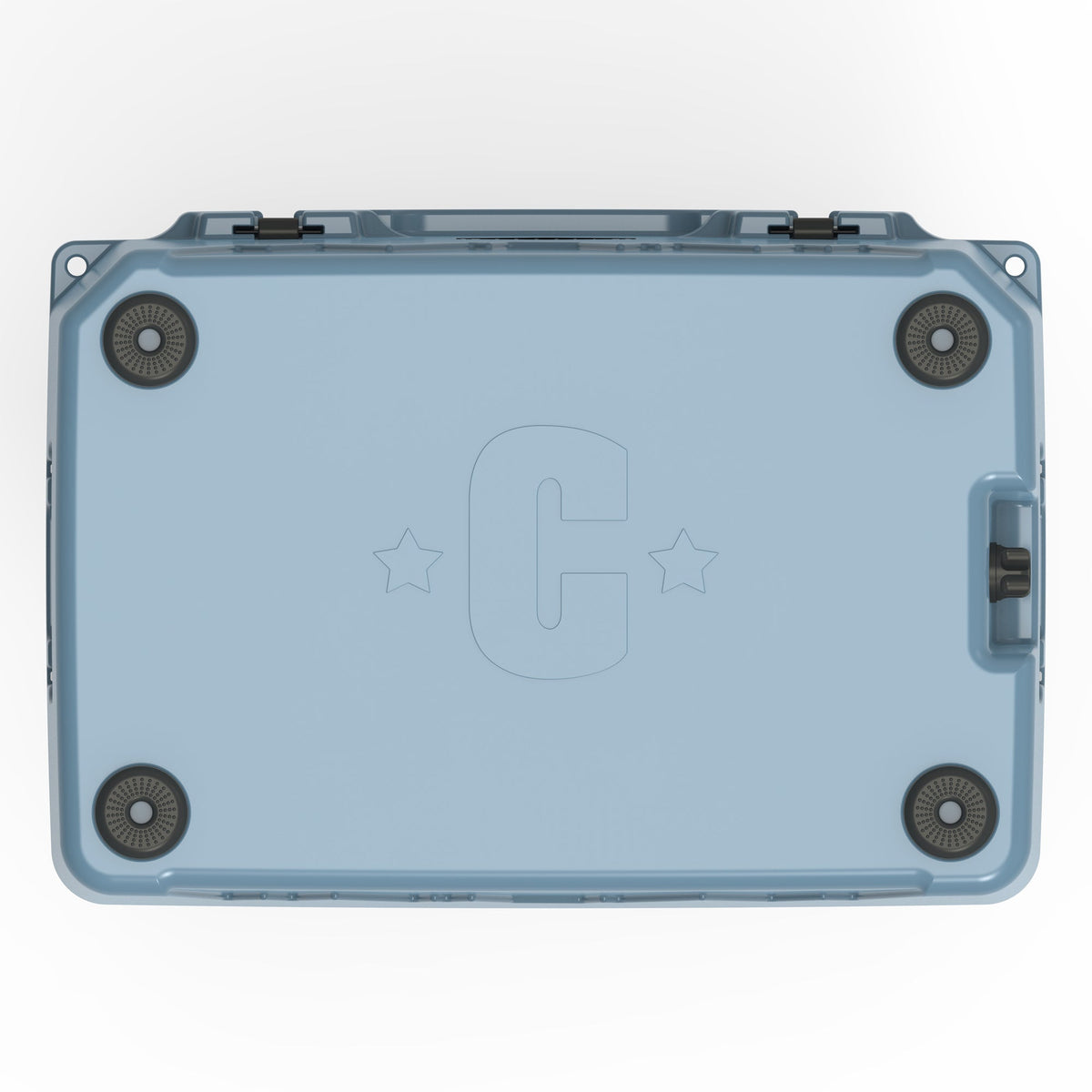 Underside of the slate-blue hard cooler with four rubber feet and a molded C logo