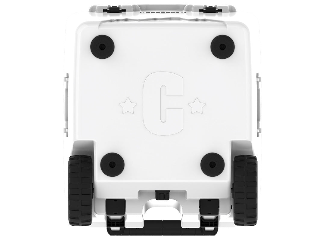 Underside of the white wheeled cooler showing four rubber feet, two wheels and a molded C logo