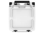 Top-down view of the white wheeled cooler's closed lid and folded black handle