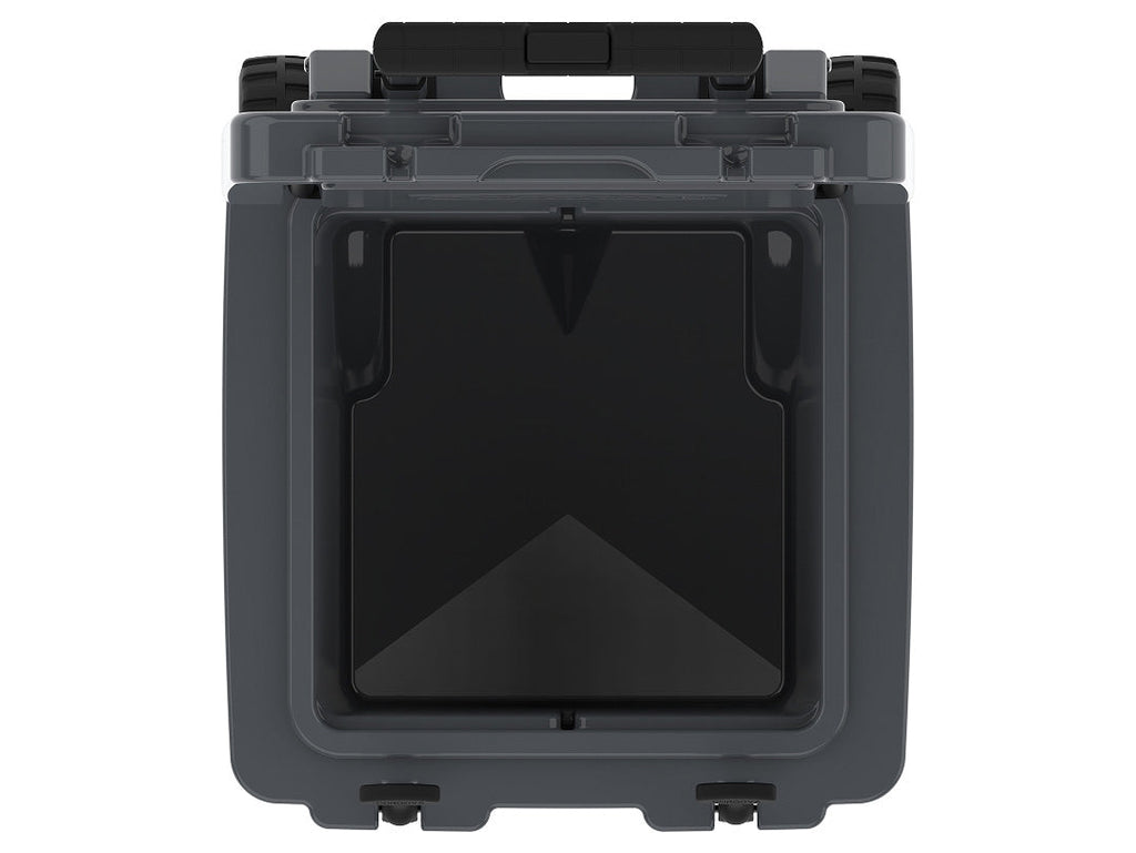 Top-down view into the open charcoal gray wheeled cooler's empty insulated well