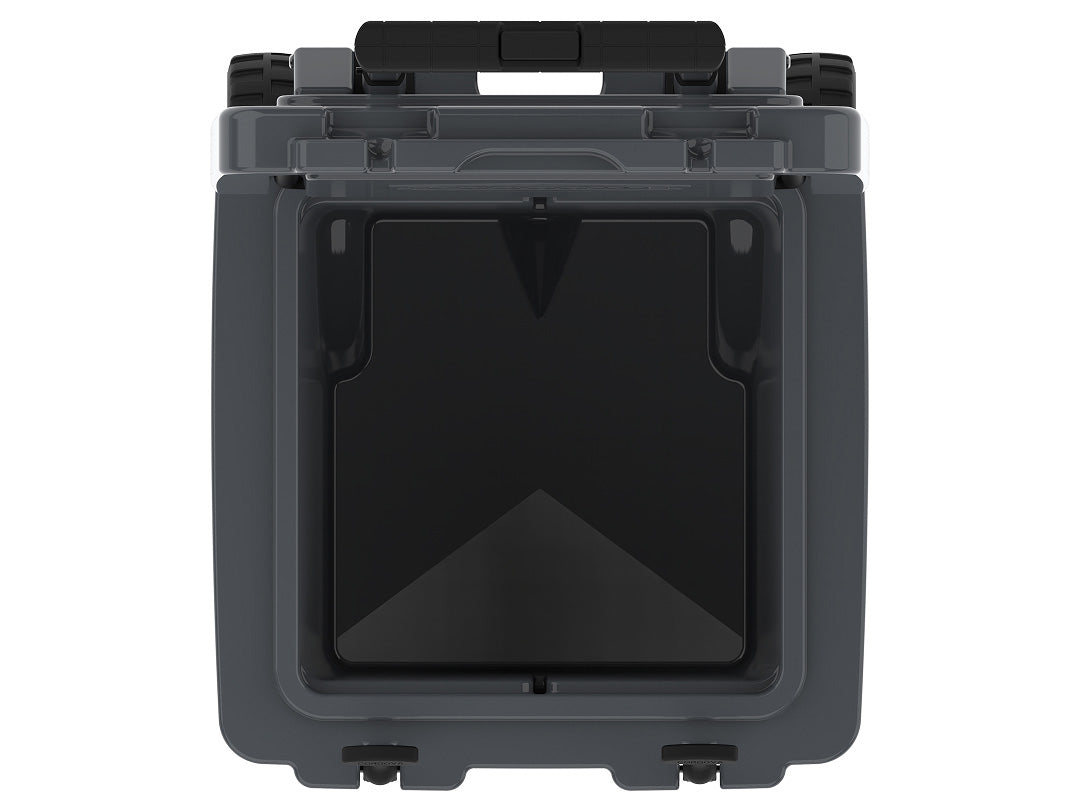 Top-down view into the open charcoal gray wheeled cooler's empty insulated well