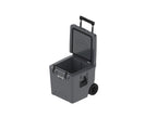 Charcoal gray wheeled cooler at an angle with the lid propped open