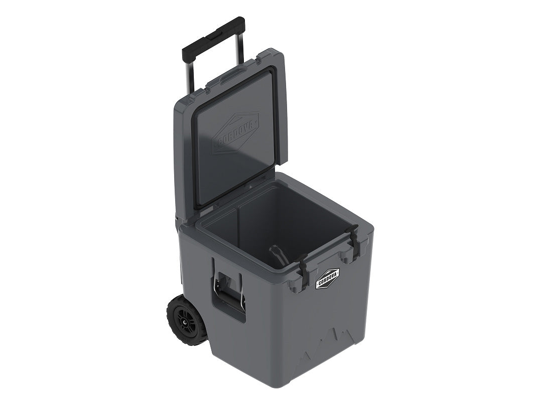 Charcoal gray wheeled cooler at an angle with the lid open and the handle up