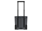 Back of the charcoal gray wheeled cooler with the telescoping handle raised between two wheels