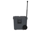 Side view of the charcoal gray wheeled cooler with the telescoping handle extended