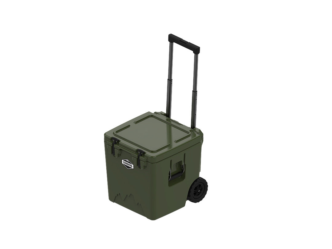 Olive green wheeled cooler from above at an angle, lid closed, handle raised