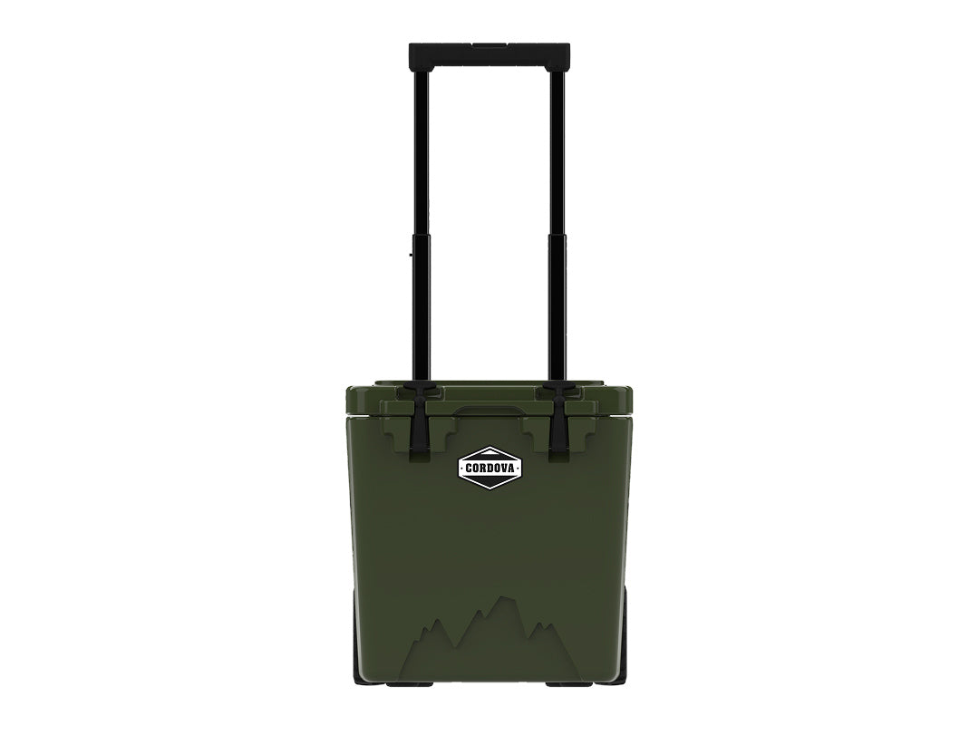 Olive green wheeled hard cooler from the front with its telescoping handle fully raised
