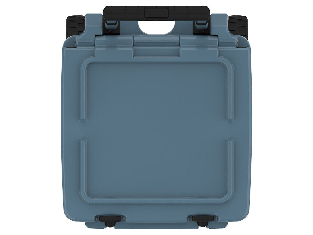 Top-down view of the slate-blue wheeled cooler's closed lid and folded black handle
