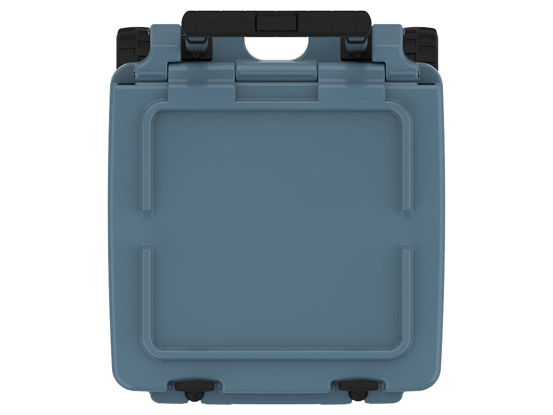 Top-down view of the slate-blue wheeled cooler's closed lid and folded black handle