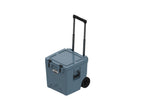 Slate-blue wheeled cooler from above at an angle, lid closed, handle raised