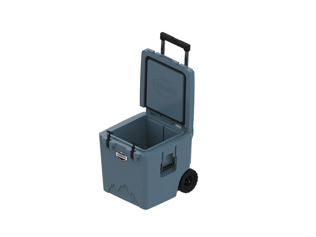 Slate-blue wheeled cooler at an angle with the lid propped open and the handle up