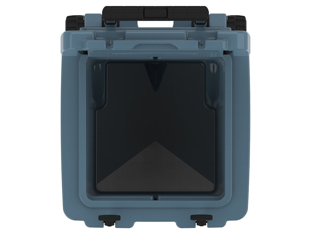 Top-down view into the open slate-blue wheeled cooler, an empty square insulated well